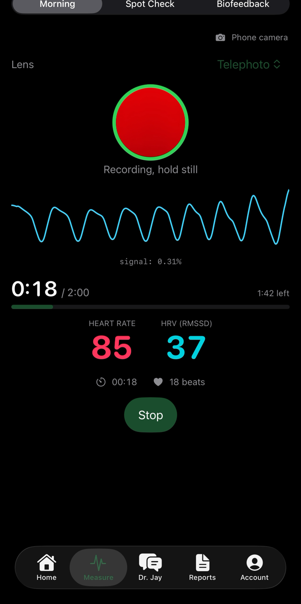 A reading in progress, the live pulse waveform on screen with heart rate at 85 and RMSSD at 37