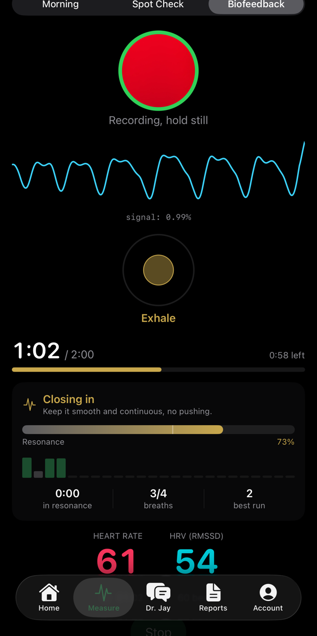 A biofeedback session approaching resonance, heart rate 61 and RMSSD 54, the app reading Closing in